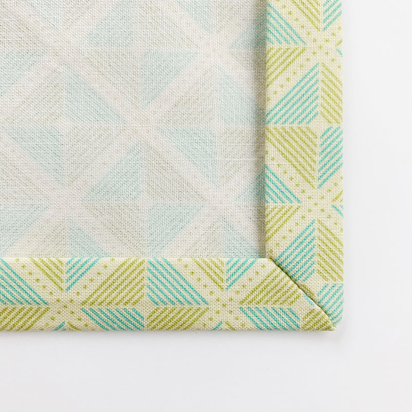mitered corners of sew cloth napkins