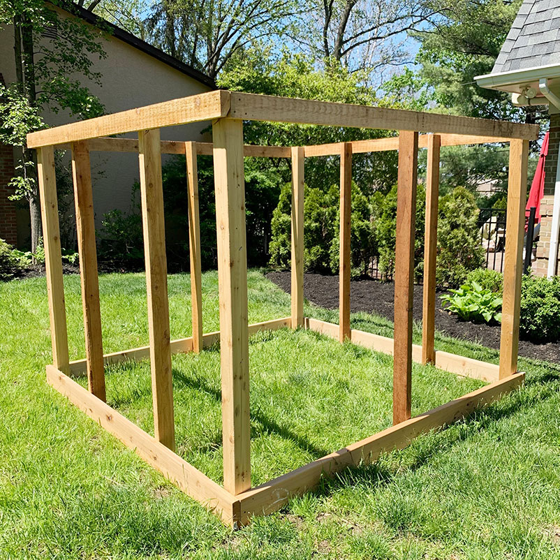 outside frame constructed of enclosed garden. 8 foot by 8 foot base, 6 feet high