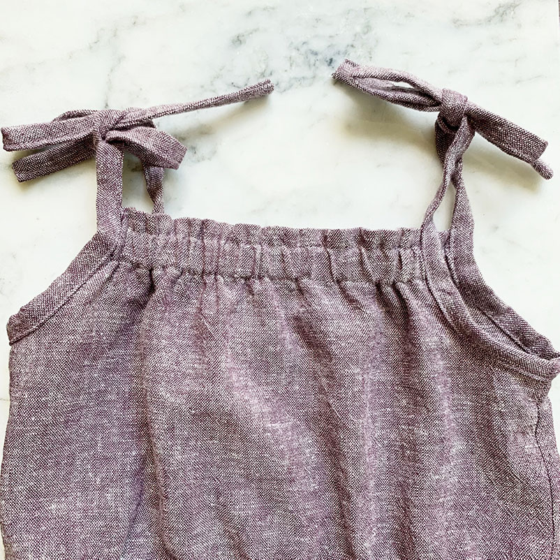 summer romper for kids by purl soho overhead shot